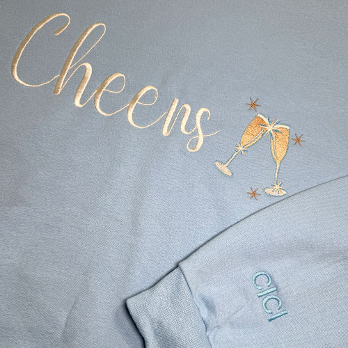 Fun sweater with name on sleeve